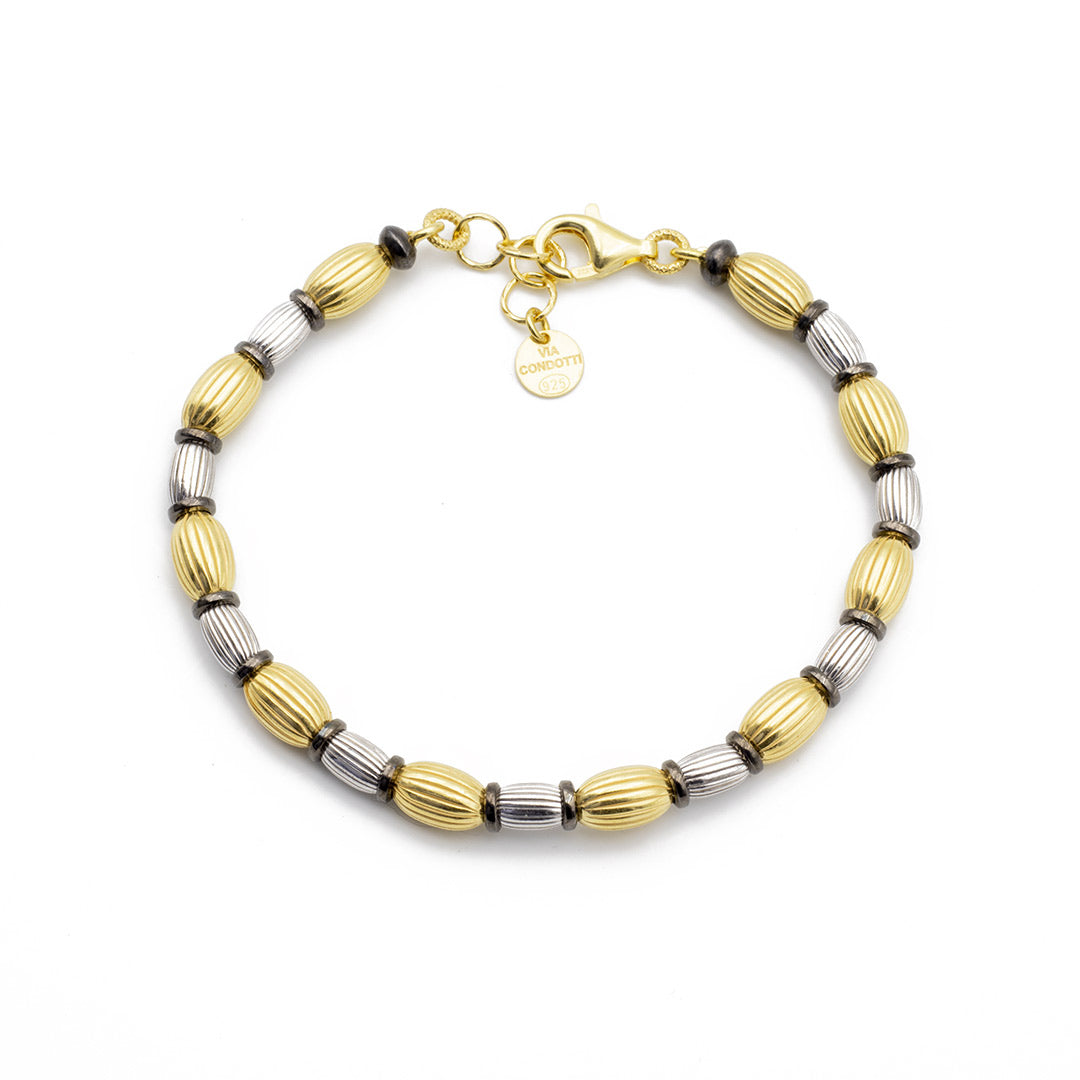 braccialetto da donna in argento 925 con elementi ovali rigati dorato e rodiato - via condotti store
