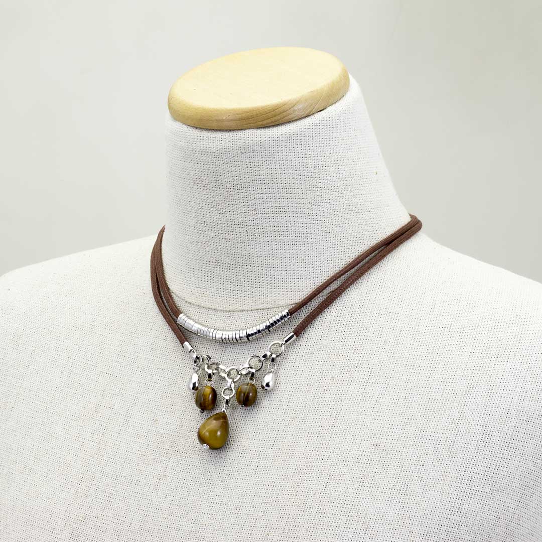 Collana in corda marrone con charms in Argento e Occhio di Tigre - via condotti store