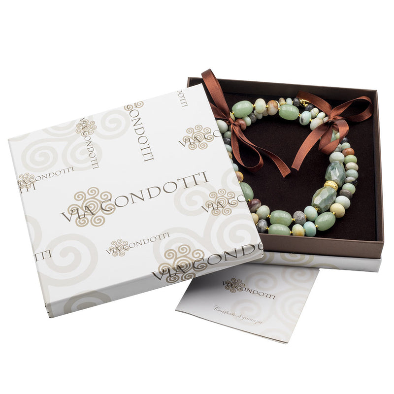 confezione con astuccio e garanzia con collana all'interno - via condotti store