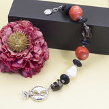 Bracciale in argento con corallo, lava e madreperla - via condotti store