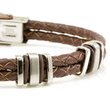 particolare del bracciale da uomo con doppio filo intrecciato di pelle colore marrone con inserti in acciaio - via condotti store