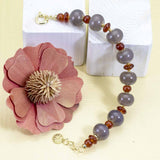Bracciale in Argento placcato oro e pietre dure naturali con Onice grigio e corniola - via condotti store