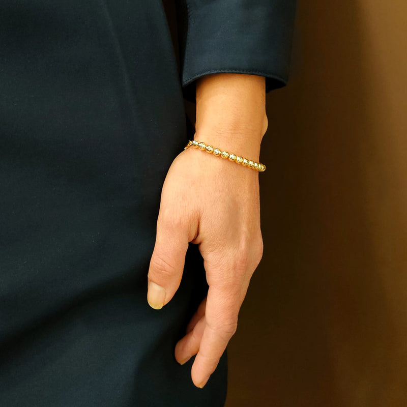 bracciale sfere diamantate in argento placcato oro indossato - via condotti store 