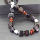 Collana in pietre dure e argento con legno ebano corniola e perle - via condotti store